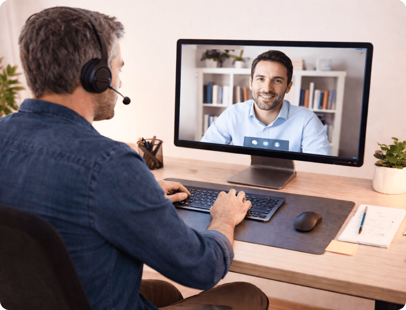 Remote professional on a video call – tablet and mobile hero image