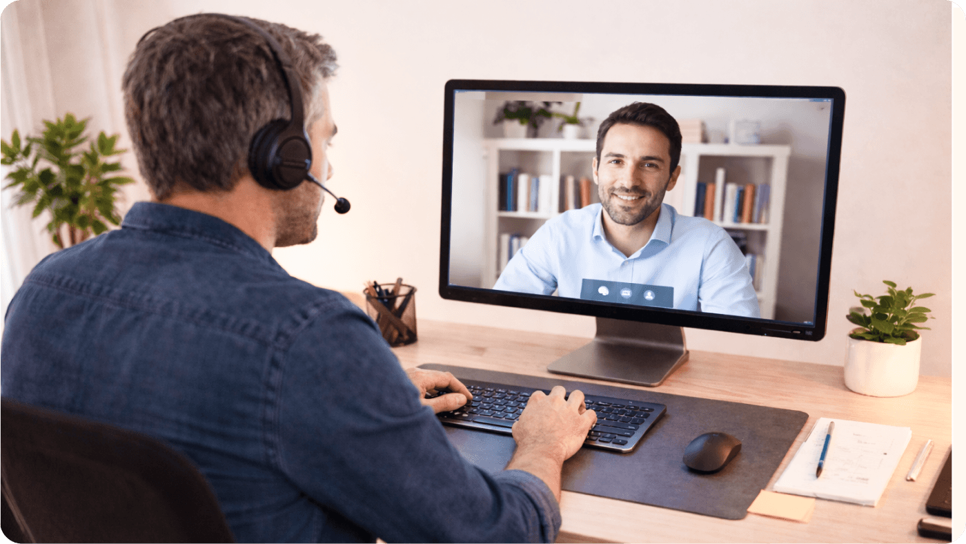 Remote professional on a video call – desktop hero image